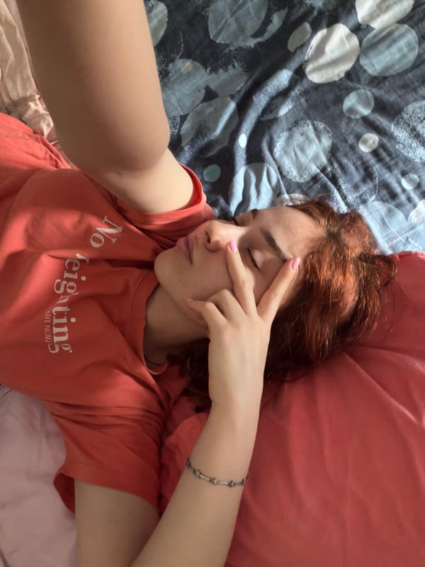 Woman takes bedroom selfies in Strasbourg apartment