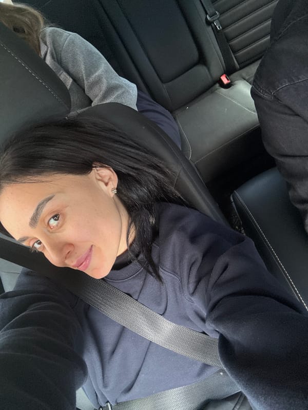 Woman photographed in car interior, Tbilisi, Georgia