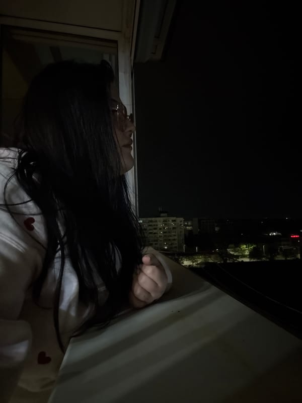 Woman spotted at window during nighttime in Sofia