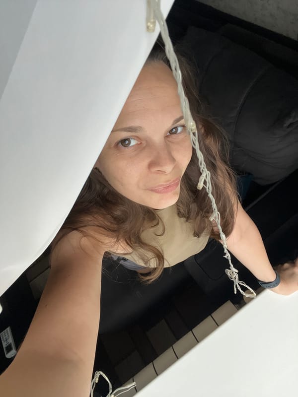 High-angle selfie with string lights in Tolyatti