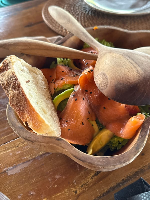 Simple salad meal documented in wooden bowl, Indonesia