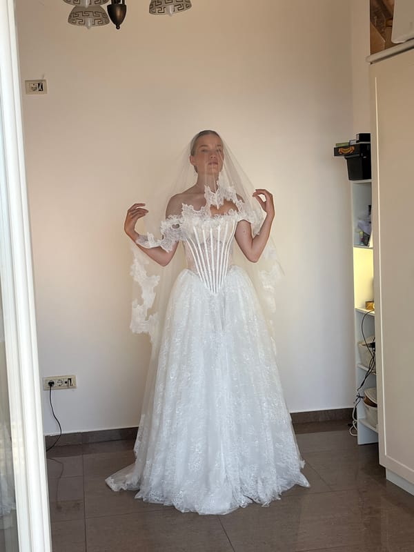 Bride poses for wedding photos in Budva indoor session
