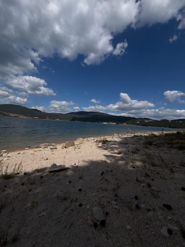 A laid-back lake fishing day with mountain backdrops