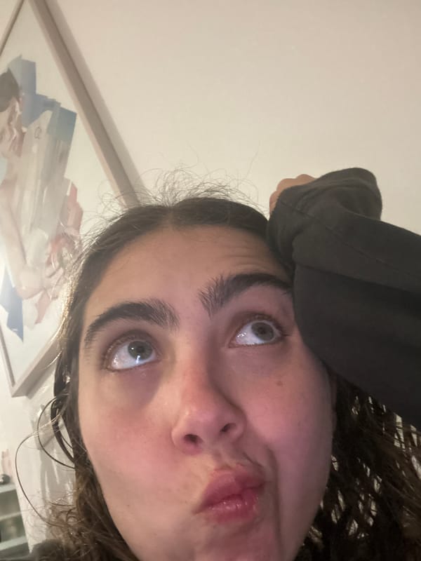 Woman poses for playful portrait photo in Jordan home