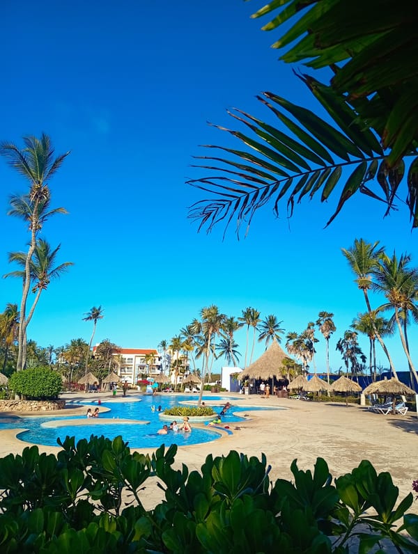 Families enjoy evening recreation at Venezuelan beach resort