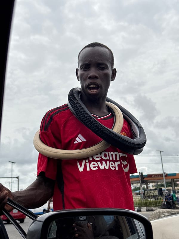 Street life documented in Alaguntan Nigeria during afternoon hours