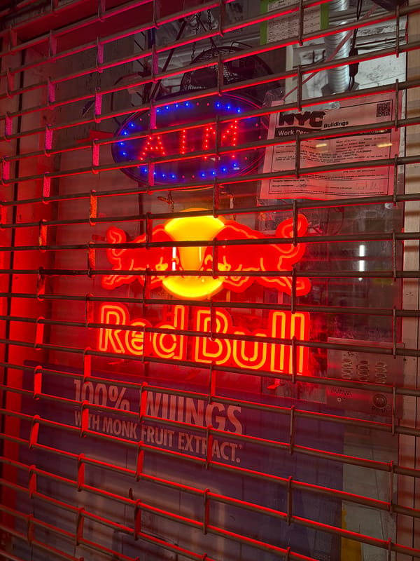 Late-night street life near a taco spot in Lower Manhattan