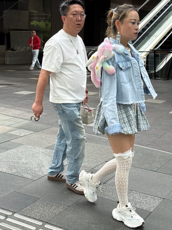 Morning pedestrians spotted near Chengdu shopping district