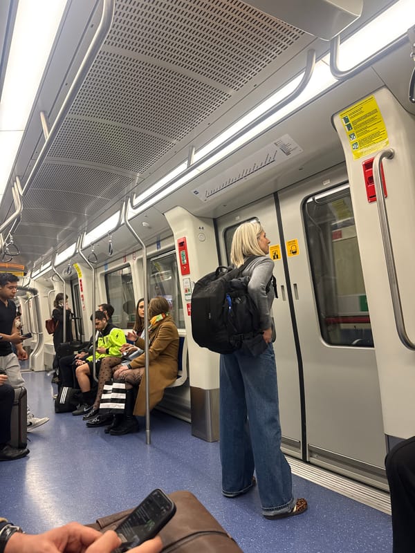 Overhead view of modern transit car interior captured