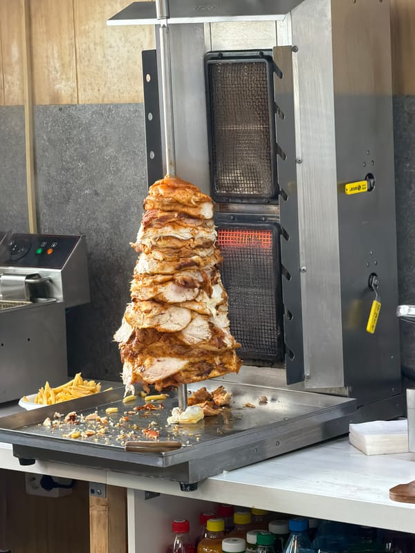 Rotisserie kebab preparation observed in Krasnoyarsk restaurant