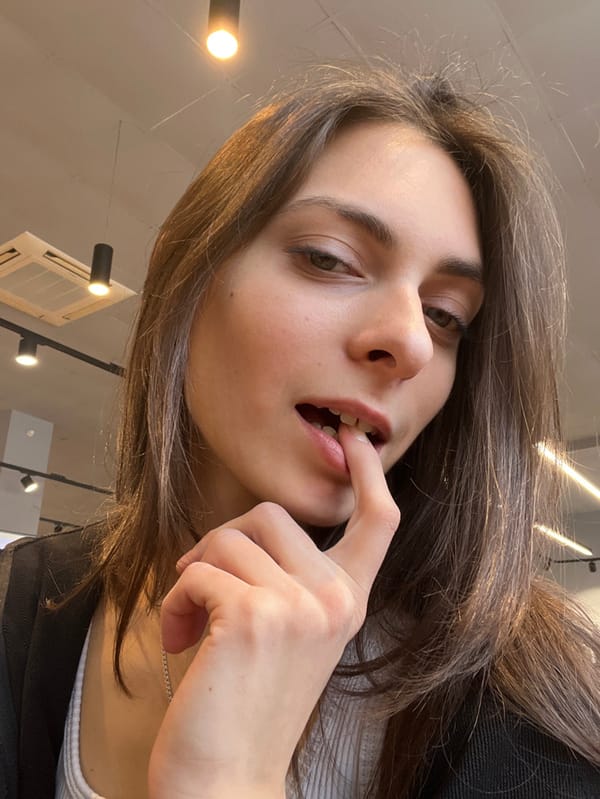 Woman takes morning selfies in Krasnoyarsk retail locations