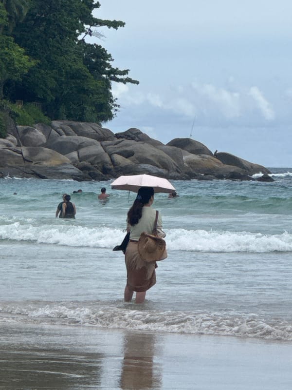 Lazy morning scene at Karon Beach, pigeon included