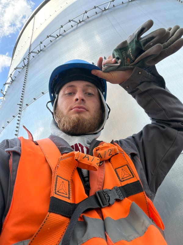 Construction site selfies from inside a rising steel-frame building