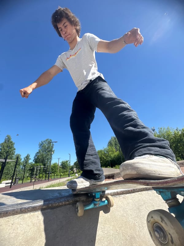 Skateboarding session at an outdoor skatepark in Divnogorsk