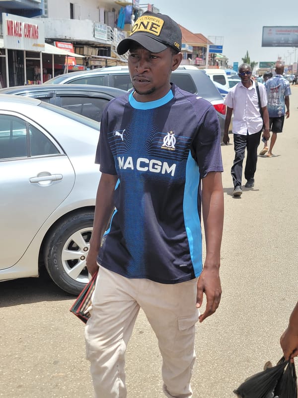 Daily street commerce and pedestrian activity documented in Jos