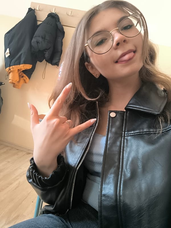 Young adults take selfies in Pernik classrooms during morning hours