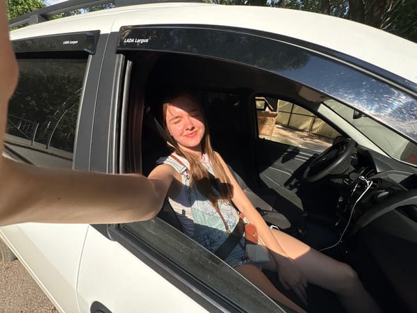 Woman takes car selfies in Perm, Russia