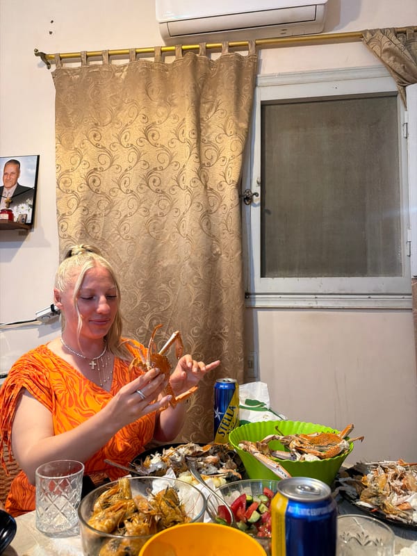 Woman enjoys crab feast at Al Hadaba residence