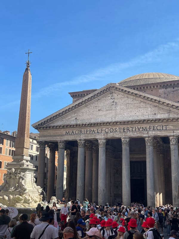 Tourists visit Pantheon and baroque church in Rome