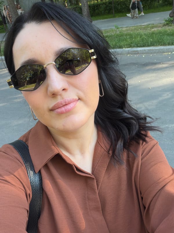 Woman enjoys donuts and selfies during Moscow park outing