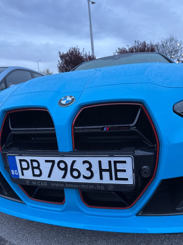 Young man poses with BMW for selfies in Plovdiv