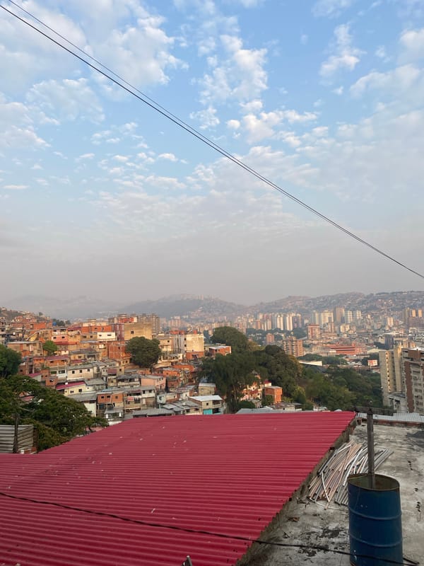 Rooftop scene captured in Caracas with fluorescent tubes visible