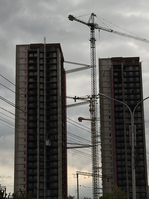 Routine urban moments documented across Tbilisi on cloudy afternoon