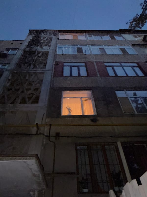 Afternoon to nightfall across a Shymkent residential neighborhood