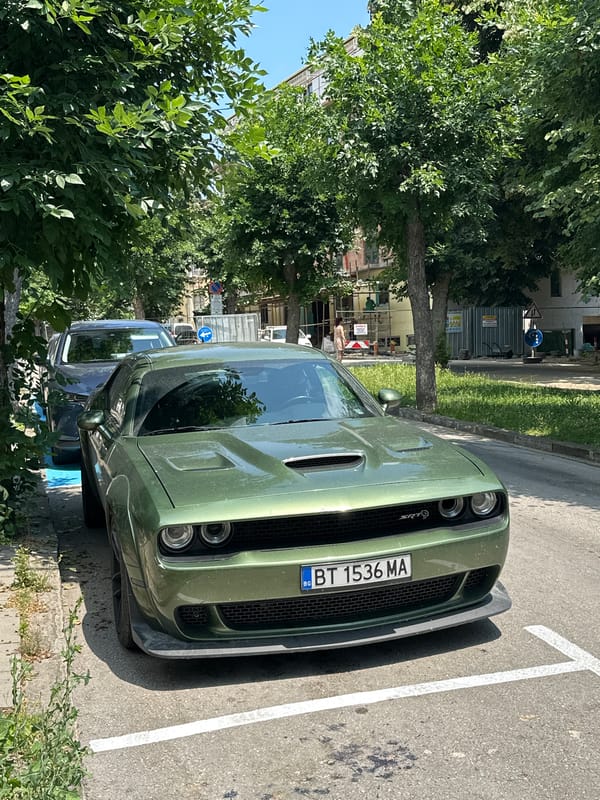Green Dodge Challenger SRT parked in Veliko Tarnovo, Bulgaria