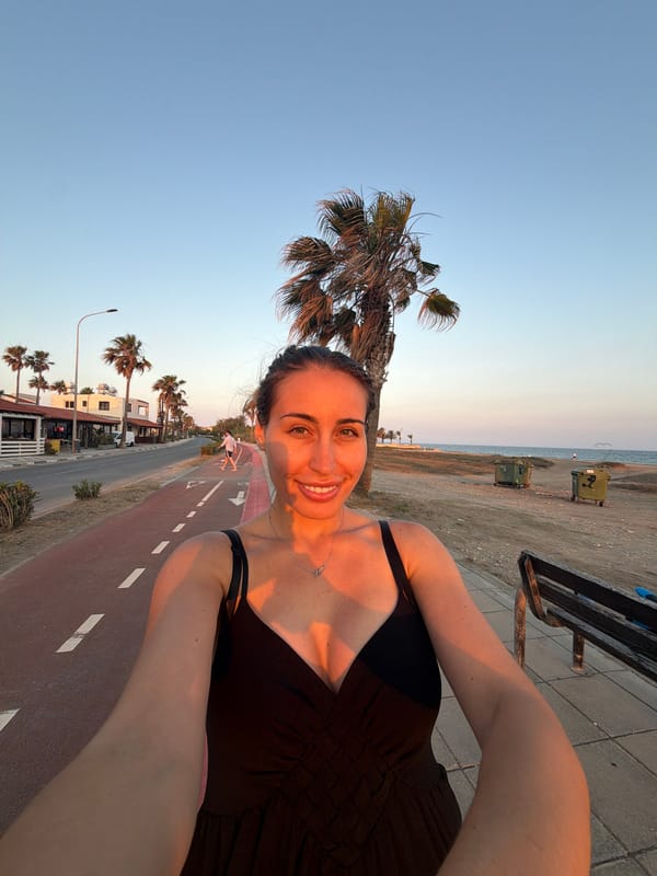 Sunset stroll along Meneou's coastal palm-lined path