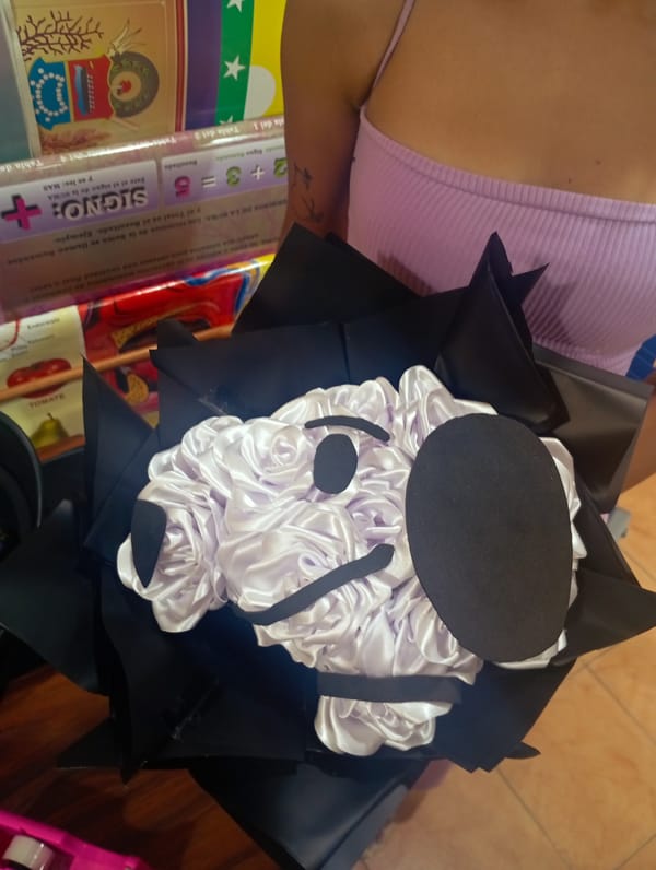Character-faced fabric bouquets displayed in Juan Griego, Venezuela