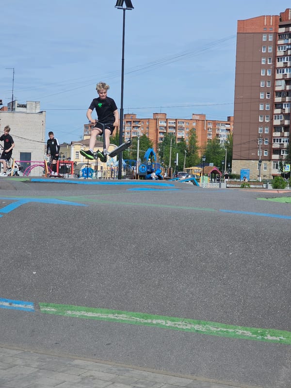 Youth skateboarding and socializing in Tosno, Russia