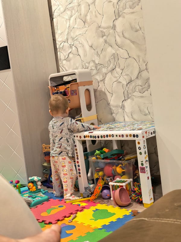 Child plays with colorful toys during afternoon playtime
