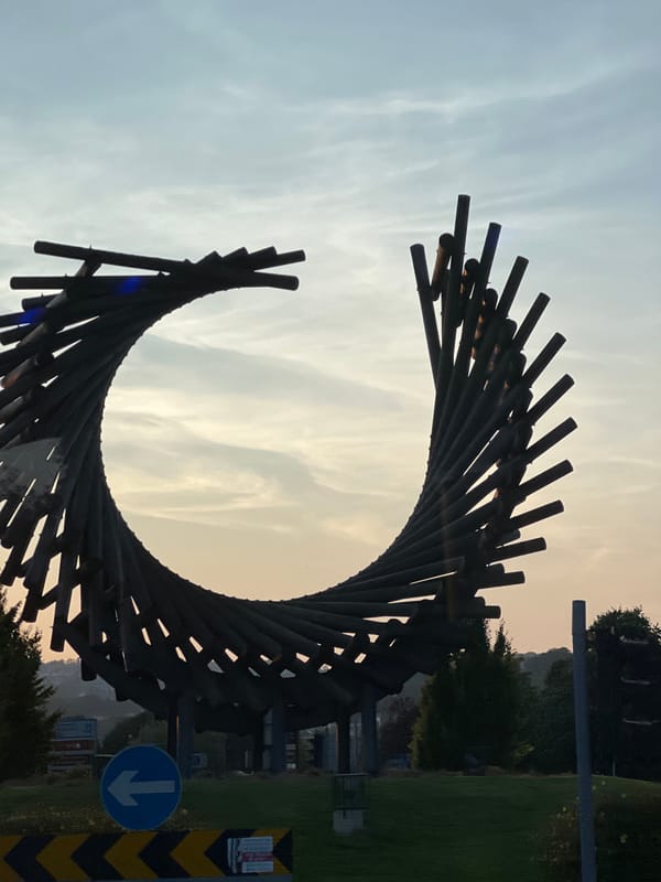 Outdoor sculptures and a hazy sunset in Letterkenny, Ireland