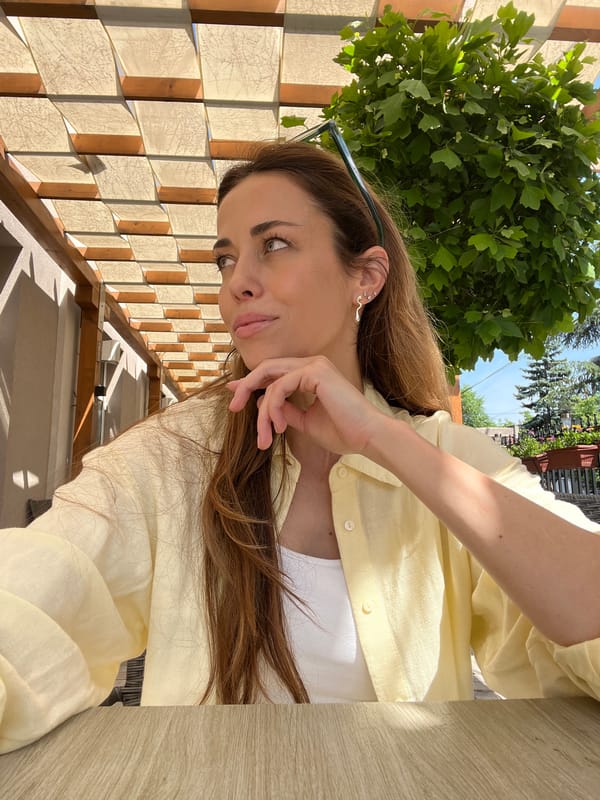 Woman photographed near decorative wall in Belgrade's Vracar district