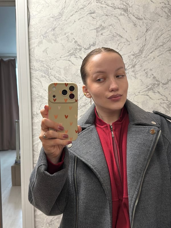 Woman documents morning selfie and makeup routine in Russia