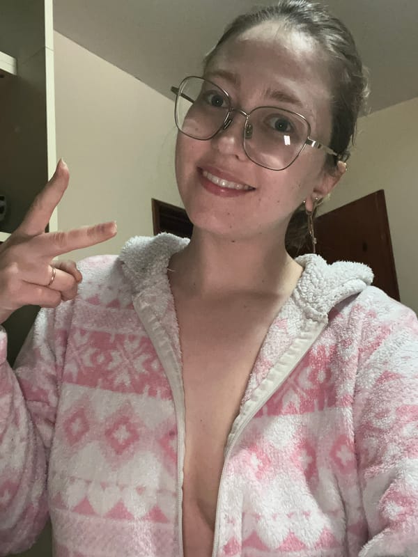 Person in fleece jacket photographed smiling in Podgorica