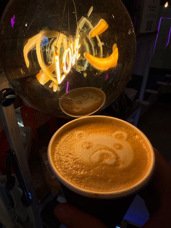 Latte art and oranges at a Moscow café
