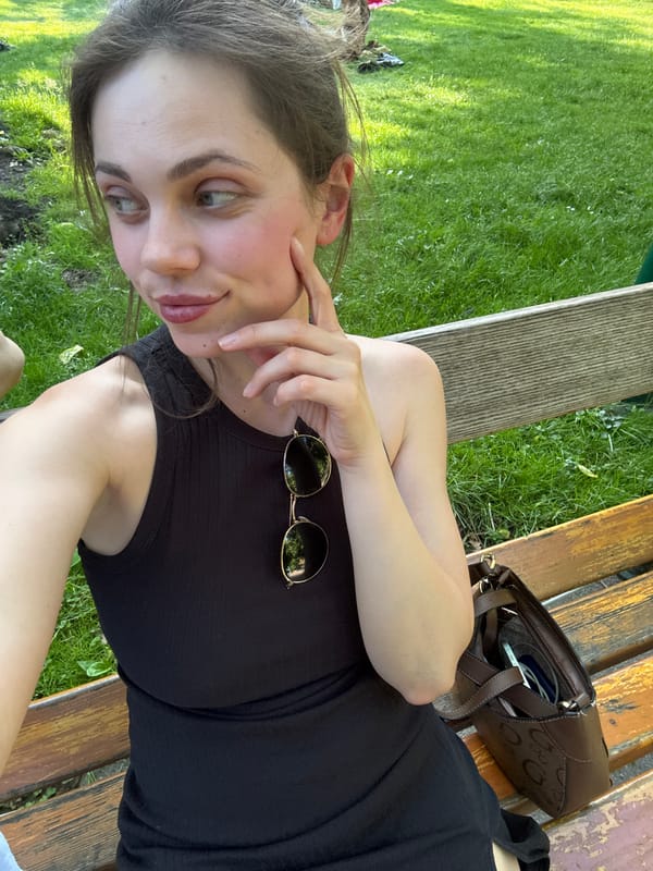 Woman enjoys sunny afternoon in Vienna's Stadtpark