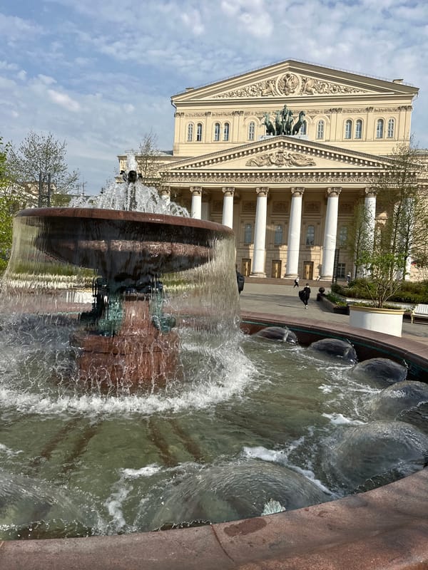Early morning activity captured at Moscow's Bolshoi Theatre fountain