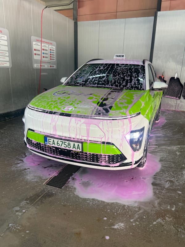 Taxi journey documented through car wash, streets, and amusement park
