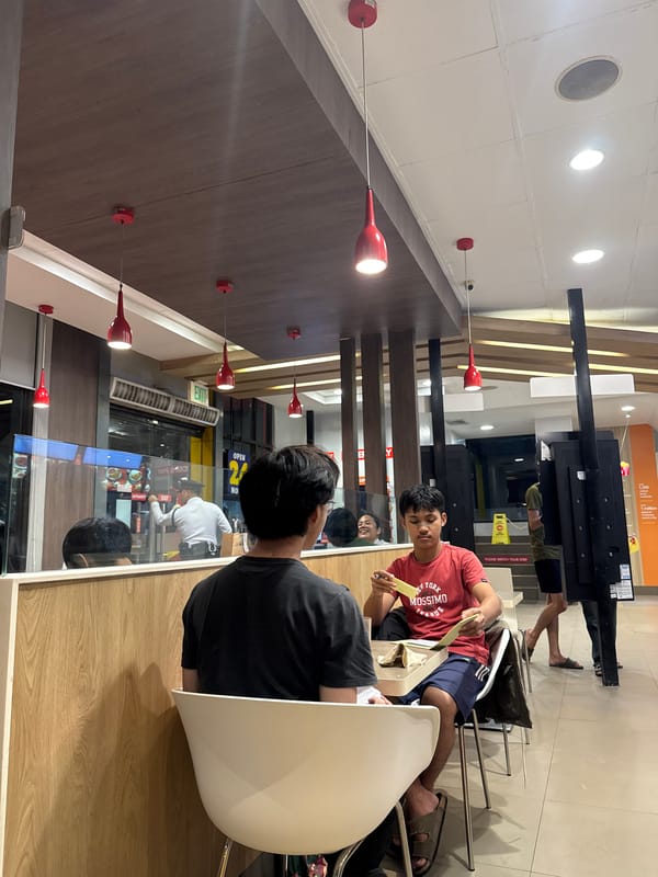 Lunch crowd documented at Jollibee restaurant in Davao City
