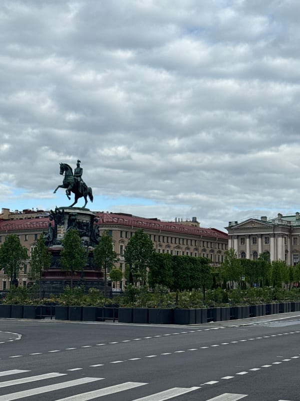 Tourist documents Bronze Horseman and St. Isaac's Cathedral in Petersburg