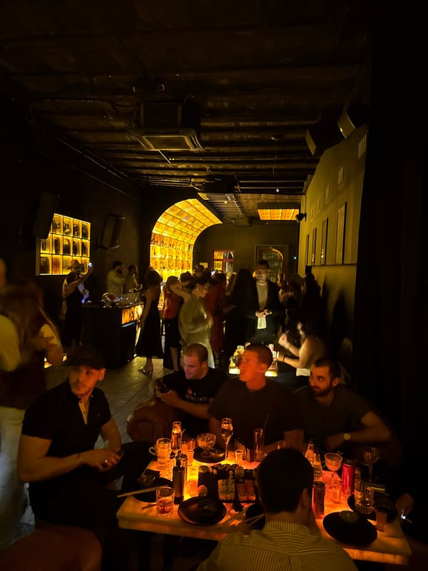 A Tbilisi night moves through bars, dinners, and red carpets