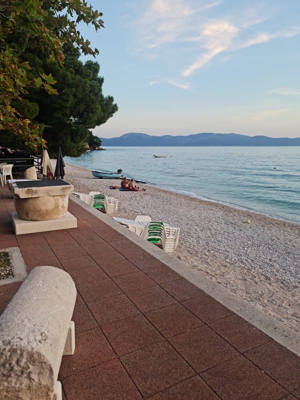 Gradac waterfront at golden hour: beaches, boats, and blooms
