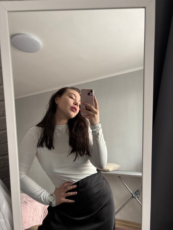 Woman documents quiet morning moments with selfies and pet