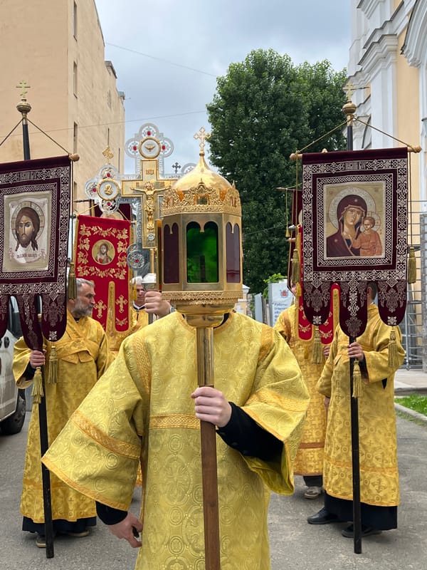 Orthodox religious procession through central Saint Petersburg streets
