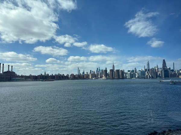 Manhattan skyline reflections captured in East River waters
