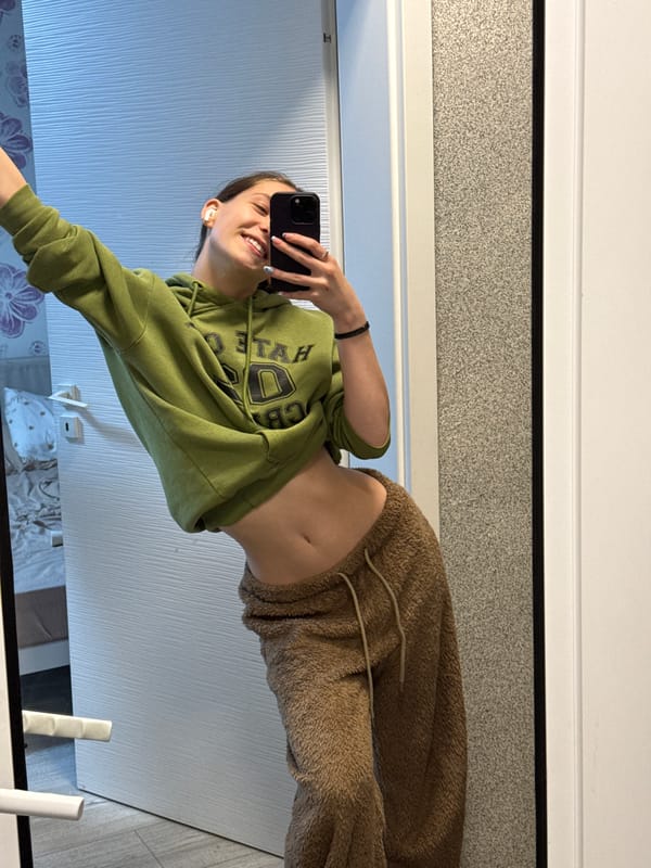 Woman takes mirror selfies in Sofia bathroom