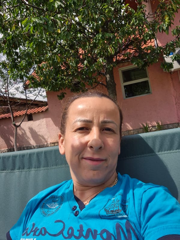 Woman photographed during casual backyard afternoon portrait session